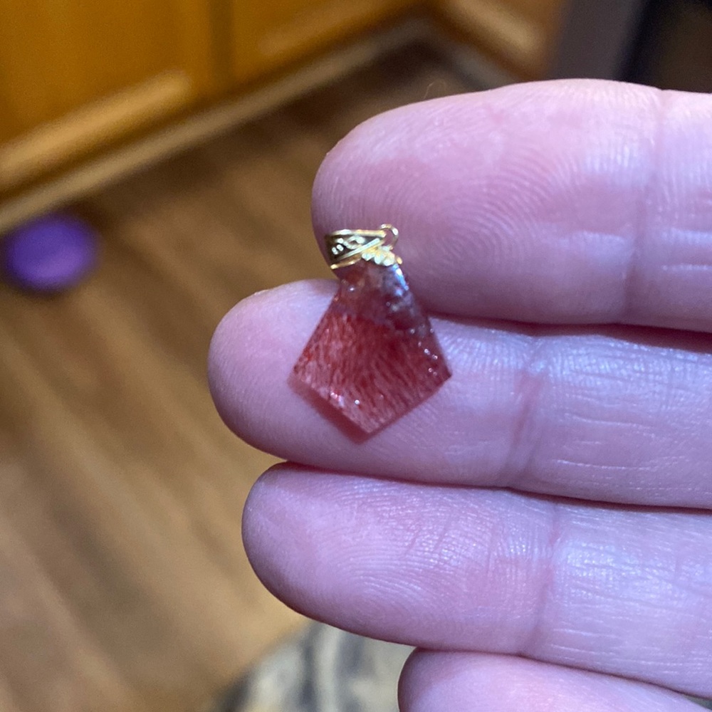 Super 7 triangle strawberry quartz pendant with 18k gold. Lowest price ever